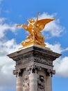 Golden statues on the Alexander III bridge in Paris Royalty Free Stock Photo