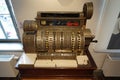 Gilded Remnants of the Past: Antique Golden Cash Register at Zons Customs Fortress City Museum . Old historic german technology in