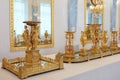 Gilded Table decorations made of bronze on the Art of Empire Exhibition in Hermitage Museum, St. Petersburg, Russia