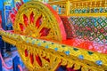 The gilden wheels of the Royal Chariot, Bangkok, Thailand