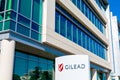 Gilead sign at headquarters. Gilead Sciences announced plans to test a treatment for COVID-19, disease caused by growing