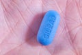 Gilead truvada pill in a hand
