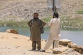 Old Pakistani Man with White Beard in Traditional Pakol