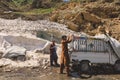 Pakistani People Collect Snow and load to the car in Mountains