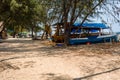 A wooden boat on a small beach on the tropical tourist island of Gili Air off the coast of Royalty Free Stock Photo