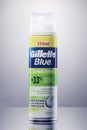 Gillette shave foam isolated on gradient background.