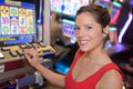 gilrs playing slot machines in casino Royalty Free Stock Photo