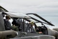 GILZE-RIJEN, NETHERLANDS - JUN 20, 2014: Pilot and gunner in an AH-64 Apache attack helicopter