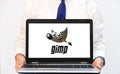 Gimp editing software computer versionon the laptop screen, editorial background