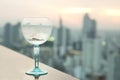 Gin tonic cocktail on table in rooftop bar