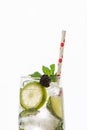 Gin tonic with lime, ice and red fruit Royalty Free Stock Photo