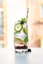 Gin tonic with lime, ice and red fruit Royalty Free Stock Photo