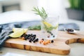 gin and tonic with lime slice and juniper berries Royalty Free Stock Photo