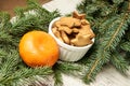 Ginger biscuits and mandarin. Branch was eaten. NewYear Royalty Free Stock Photo