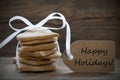 Ginger Bread Cookies with Label with Happy Holidays Royalty Free Stock Photo