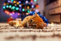 Ginger cat playing with garland and tinsel under Christmas tree. Christmas and New year concept Royalty Free Stock Photo