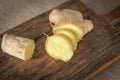 Ginger chopped and in a large piece on a chopping board in the kitchen