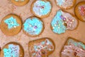 Ginger cookies in the shape of a heart and a circle on a wooden table. Cooking