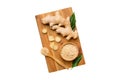 ginger on Cutting board table, isolated on white background top view. Space for text Royalty Free Stock Photo