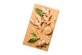 ginger on Cutting board table, isolated on white background top view. Space for text Royalty Free Stock Photo