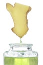 Ginger - Drop essential oil falls Royalty Free Stock Photo