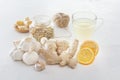 Ginger, garlic, lemon, dried medical chamomile in a jar and ginger tea - a means to protect against viral infections and colds