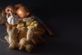 Ginger, Garlic, Onion - A Vegetable Mixture To Increase Immunity From Viruses On A Dark Table. Low Key.