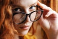 Ginger Girl Looking out of Glasses