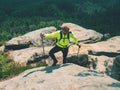 Ginger hair man tourist wear bright yellow jersey in mountains