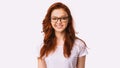 Ginger-Haired Girl In Eyewear Smiling To Camera, Panorama, Studio Shot