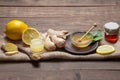 Ginger, honey and lemon, .on wooden base. Natutal food and brevage concept Royalty Free Stock Photo