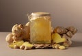 Ginger jam in small square jar and fresh ginger Royalty Free Stock Photo