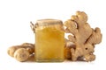 Ginger jam and fresh ginger isolated on a white background Royalty Free Stock Photo