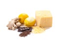 Ginger, lemon, cheese, grated cheese, chocolate, grated chocolate on a white background