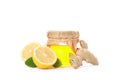 Ginger, lemons and glass jar with honey 