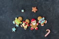 Ginger men with colored glaze on a gray background .. Gingerbread. Christmas cookies.