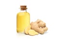 Ginger oil with rhizome sliced Royalty Free Stock Photo