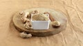 Ginger Powder in a Bowl and Raw and Dried Ginger on a Wooden Table