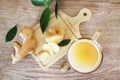 Ginger root with leaf and a glass of juice Royalty Free Stock Photo