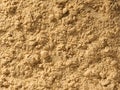 Ginger root powder condiment background, used as a spice in cooking. Organic food