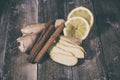 Ginger root sliced on wooden table Royalty Free Stock Photo