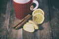 Ginger root sliced on wooden table Royalty Free Stock Photo