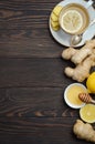 Ginger root tea with lemon and honey on wooden background Royalty Free Stock Photo