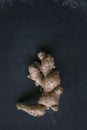 Ginger root, whole root piece on the dark background Royalty Free Stock Photo