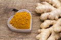 Ginger roots and turmeric on the table, top view Royalty Free Stock Photo