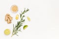 Ginger, rosemary sprig and lime. Alternative cold and flu remedy Royalty Free Stock Photo