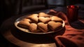 Ginger sweet cookies, milk and cocoa in the form of a heart, lie on a wooden plate against the shadowed background