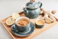 Ginger tea with lemon in a blue cup Royalty Free Stock Photo