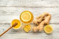 Ginger tea with lemon and honey on a white wooden background. Hot healthy winter drink Royalty Free Stock Photo