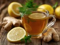 Ginger tea lemon mint hot drink immune support wood table Royalty Free Stock Photo